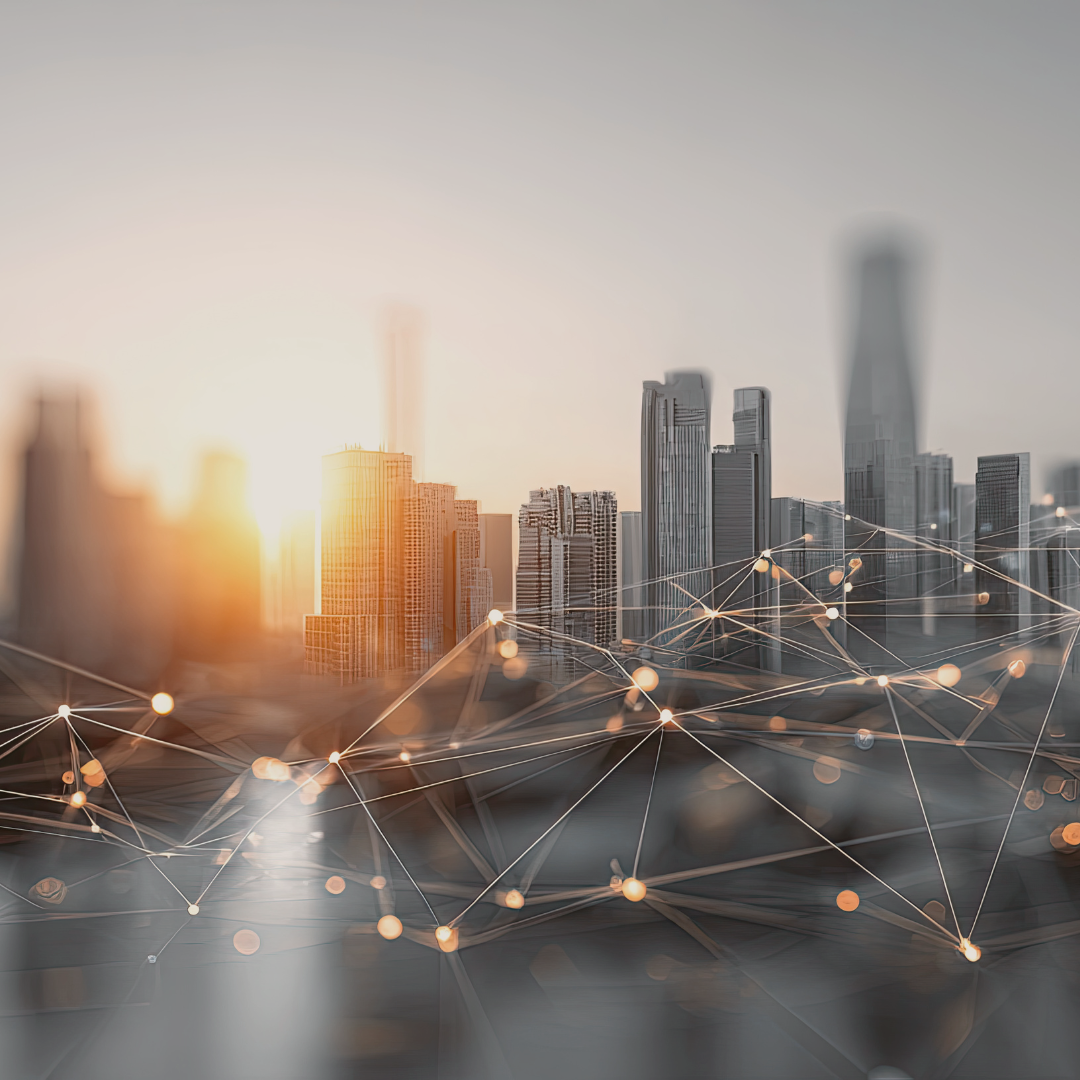 Modern city skyline illuminated by sunrise, interconnected by digital network